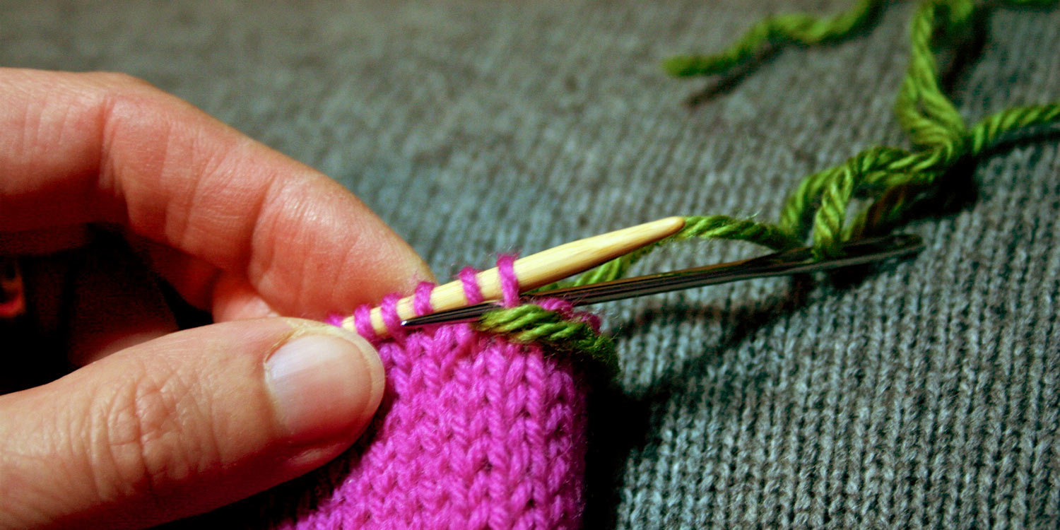 Tapestry needle is inserted purlwise into first stitch on left needle.