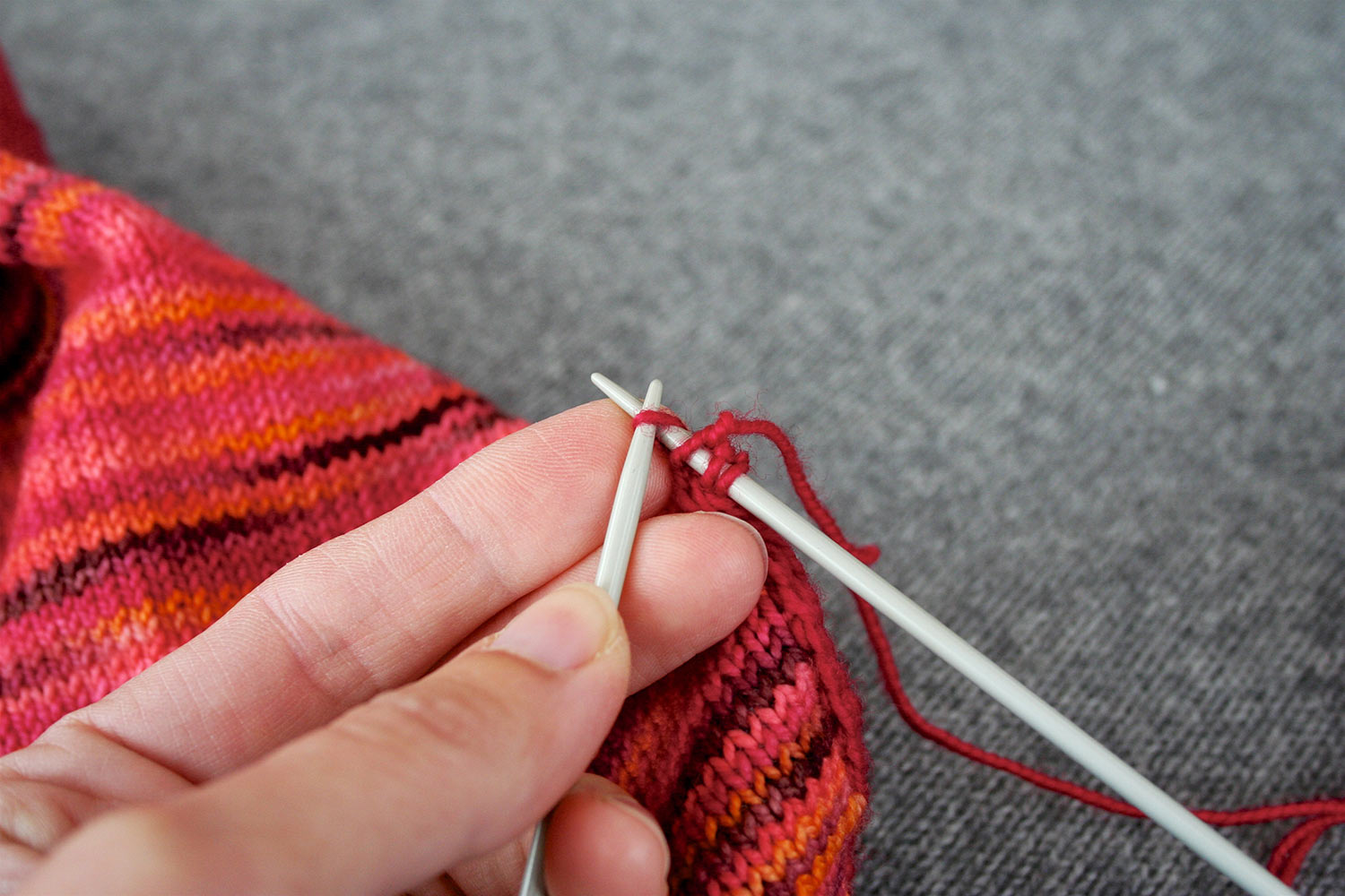 Right needle inserted knitwise into stitch on left needle.