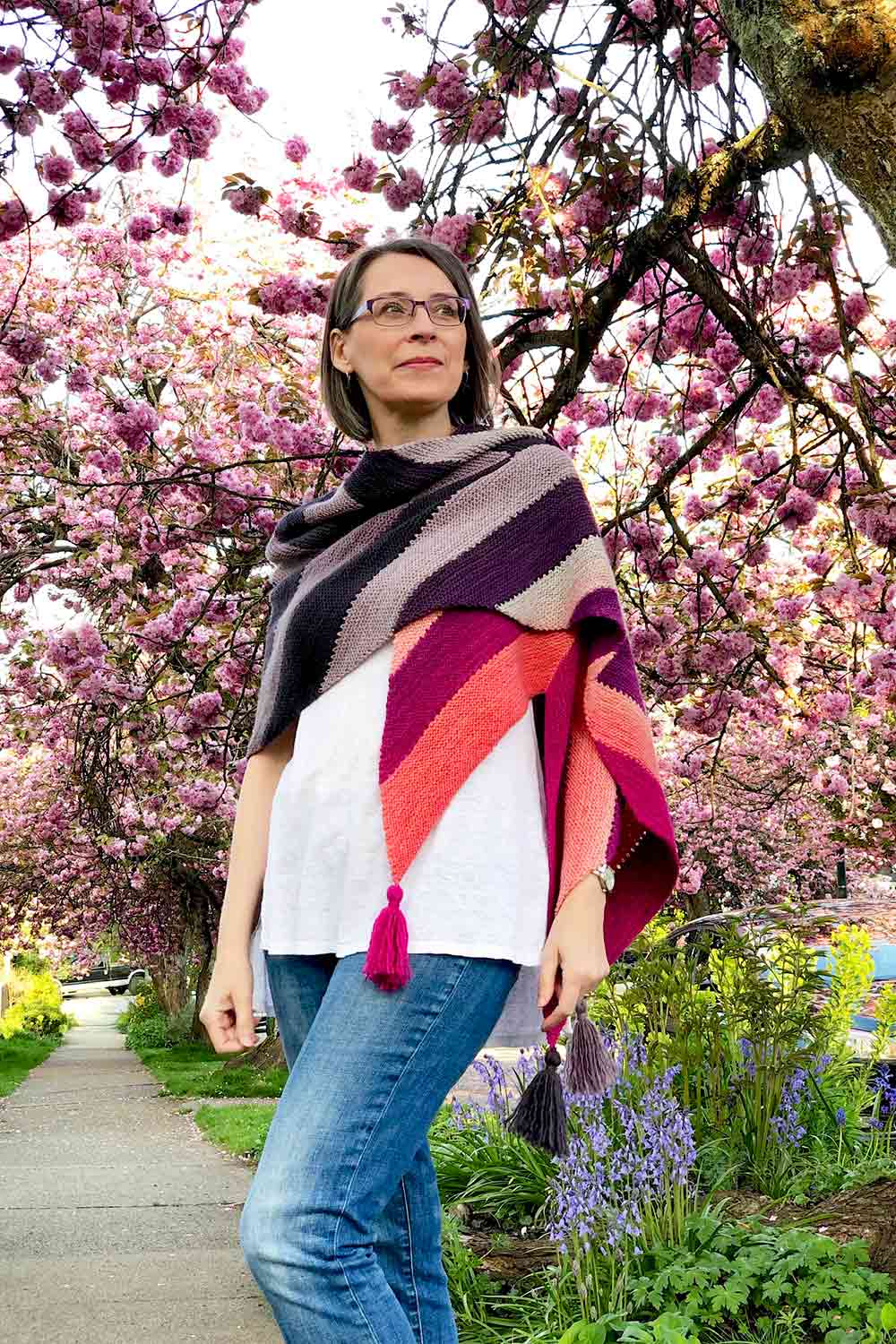 Garter stitch shawl worked in wide stripes that create a chevron shape with simple shaping.