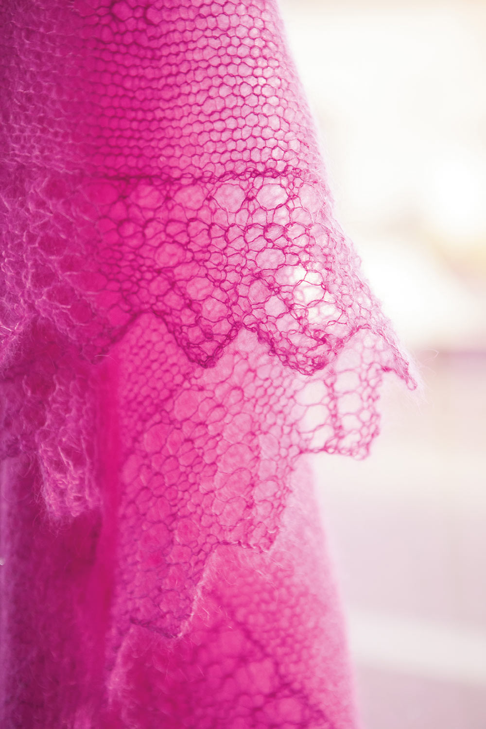 Detail shot of lace edging in a zigzag shape.