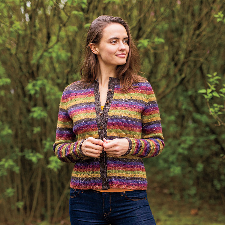 Striped cardigan with saddle shoulders and deep mock ribbed cuffs and hem.