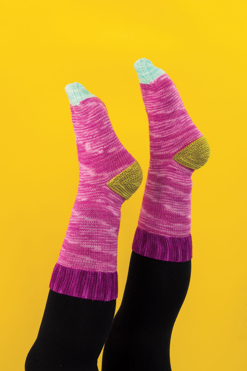 Stockinette stitch socks with garter stitch cuffs and heels.