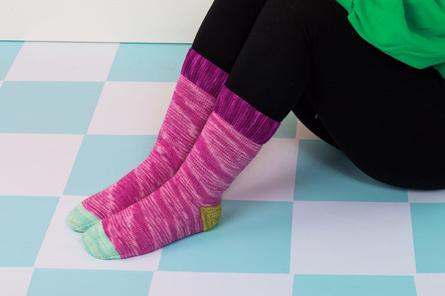 Stockinette stitch socks with garter stitch cuffs and heels.