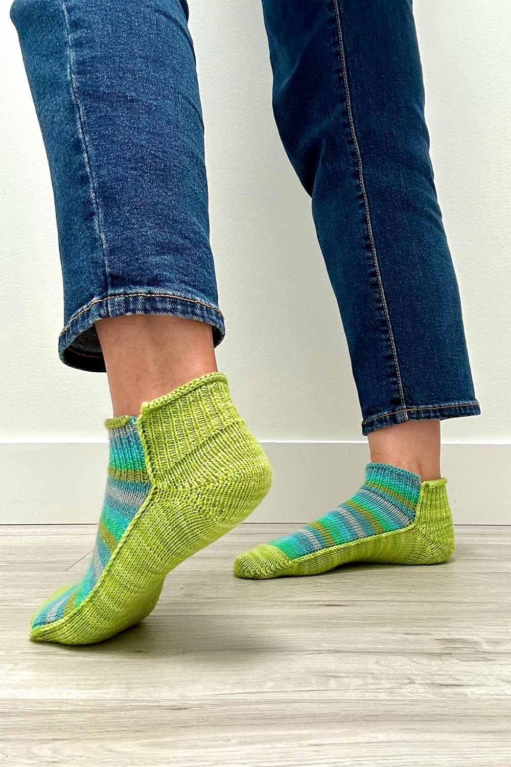 Heel view of shortie socks showing bifurcated short row heel technique.