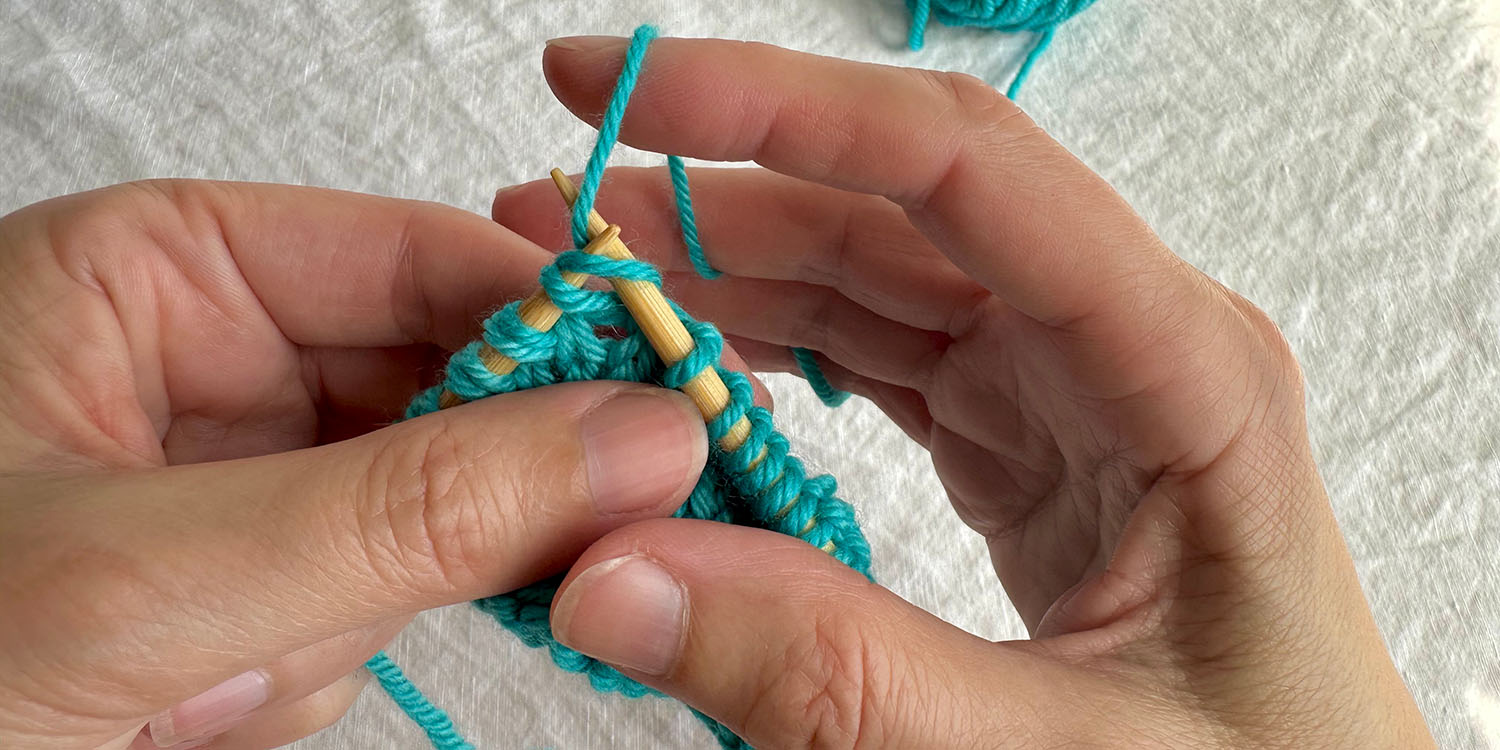 Knit into raised stitch on left needle.